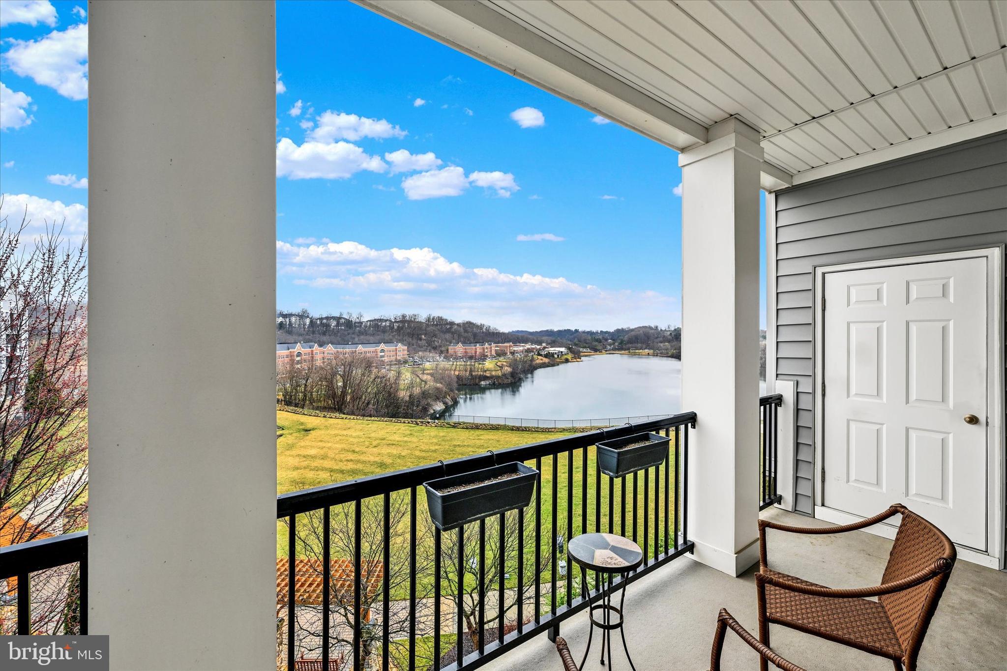 3000 Stone Cliff Drive, Unit 205 Baltimore, MD 21209 - Photo 6 of 28 a view of a city from a balcony