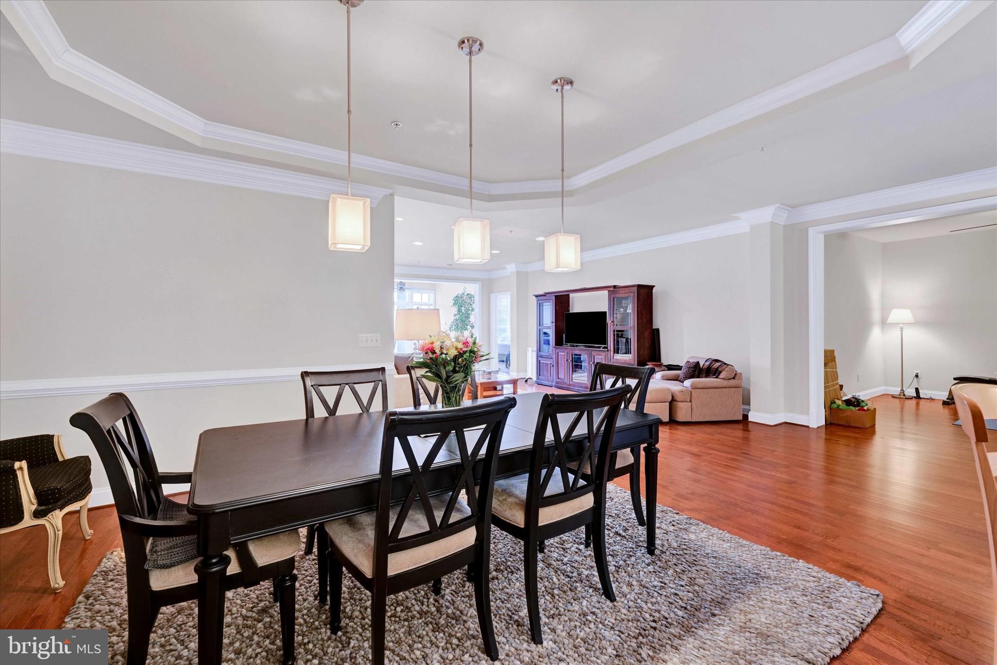 3000 Stone Cliff Drive, Unit 205 Baltimore, MD 21209 - Photo 10 of 28 a view of a dining room with furniture