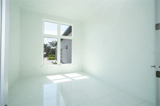 a kitchen with stainless steel appliances granite countertop a sink and a stove
