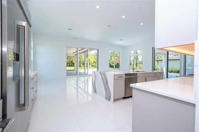 a bathroom with a shower a toilet and a sink