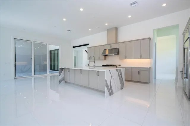 a swimming pool with outdoor seating