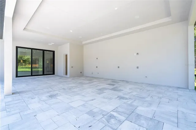 a bathroom with a shower sink vanity mirror and toilet