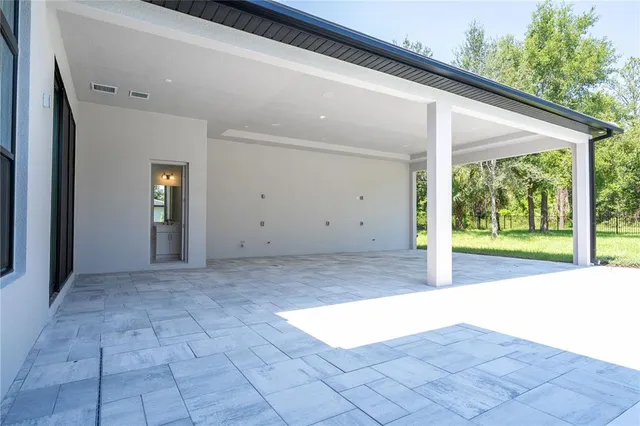 a view of a room with racks on the wall