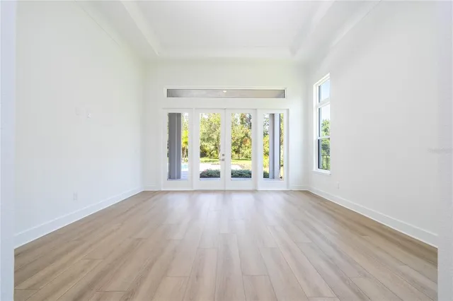 swimming pool view with a seating space
