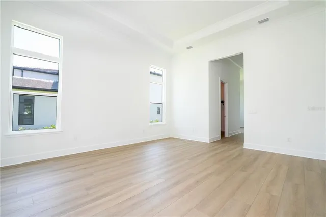 a bathroom with a shower sink and mirror