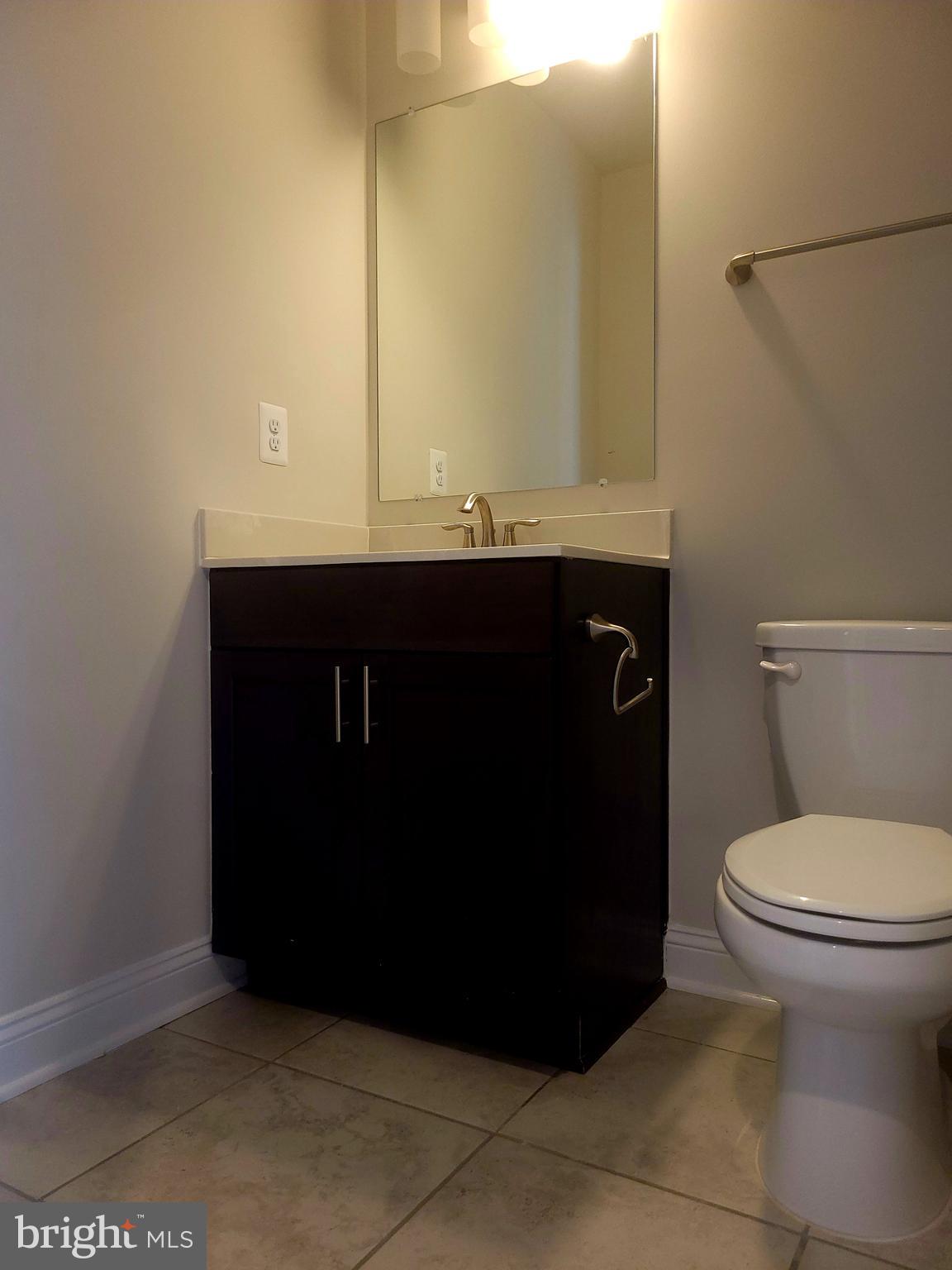 7111 Tyndale Way Hanover, MD 21076 - Photo 10 of 59 Half Bath on main level