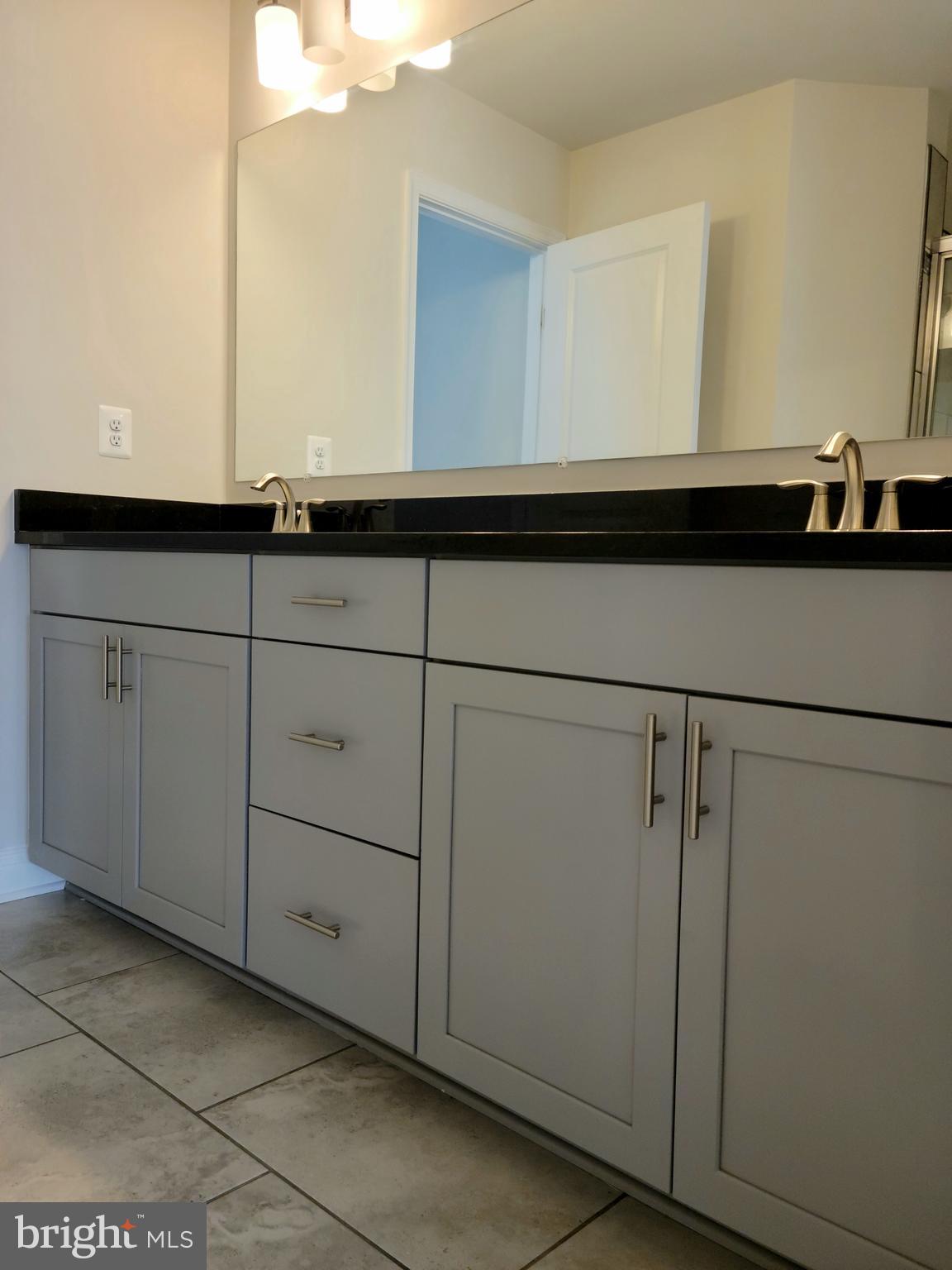 7111 Tyndale Way Hanover, MD 21076 - Photo 22 of 59 Primary bath , double sinks & cabinets