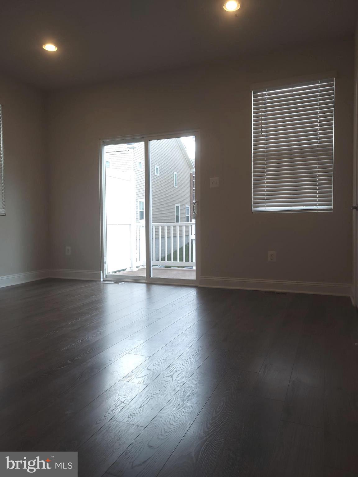 7111 Tyndale Way Hanover, MD 21076 - Photo 5 of 59 Dining area leads to deck