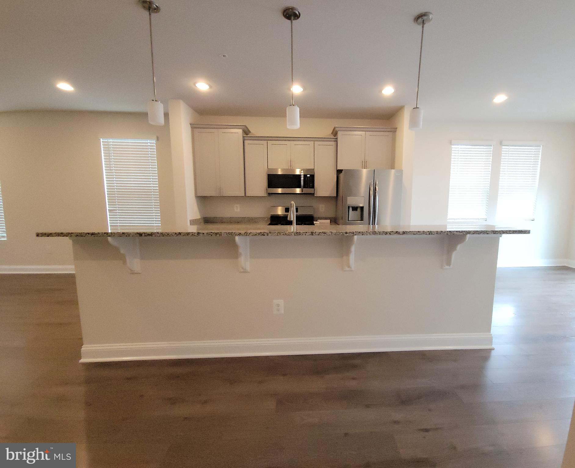 7111 Tyndale Way Hanover, MD 21076 - Photo 59 of 59 Main level open floor plan