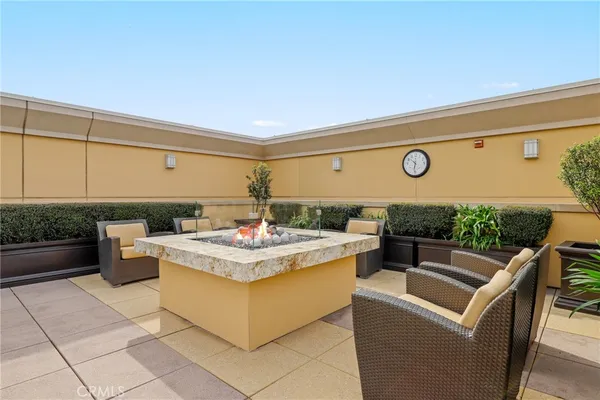 a view of a swimming pool and lounge chair