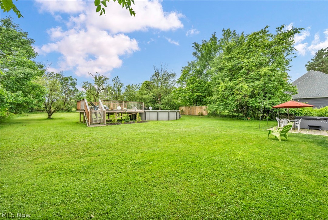 13843 Drake Road Strongsville, OH 44136 - Photo 33 of 45 View of yard featuring a deck and a patio