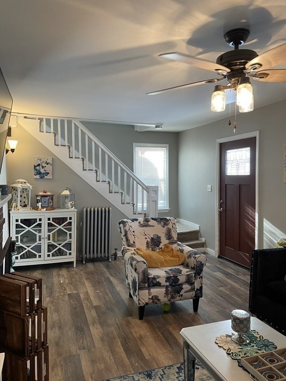 23 Preston Street Springfield, MA 01109 - Photo 6 of 24 a room with lots of wooden furniture
