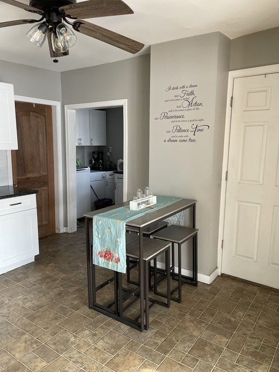 23 Preston Street Springfield, MA 01109 - Photo 10 of 24 a room with furniture and a chandelier