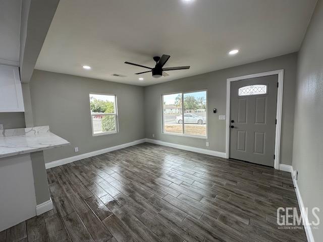 Undisclosed Address Delano, CA 93215 - Photo 3 of 15 wooden floor in an empty room with a window