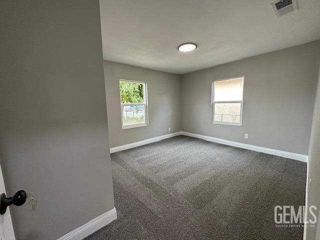 Undisclosed Address Delano, CA 93215 - Photo 10 of 15 an empty room with windows