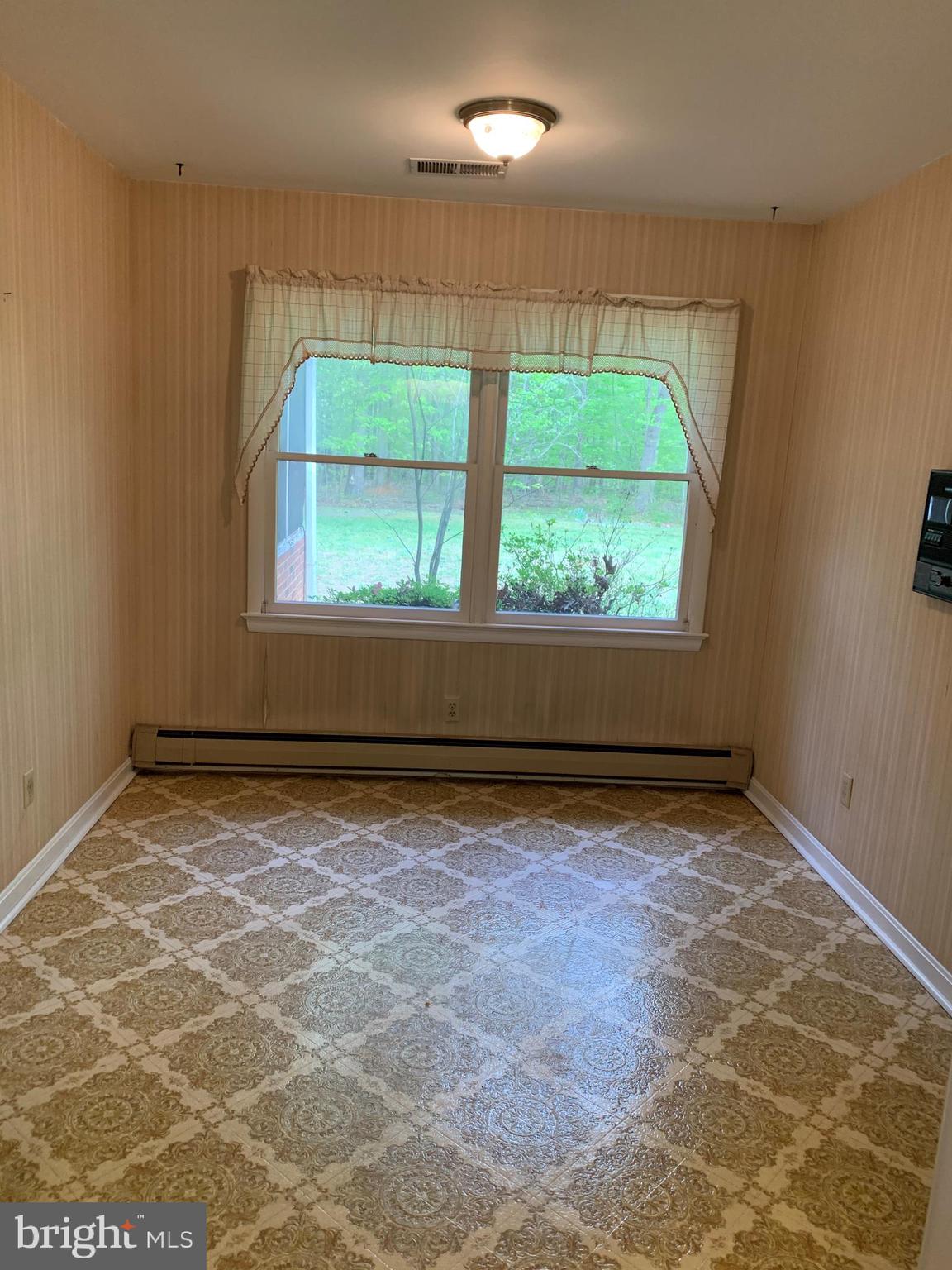4515 Shirley Gate Road Fairfax, VA 22030 - Photo 11 of 26 a view of an empty room with a window