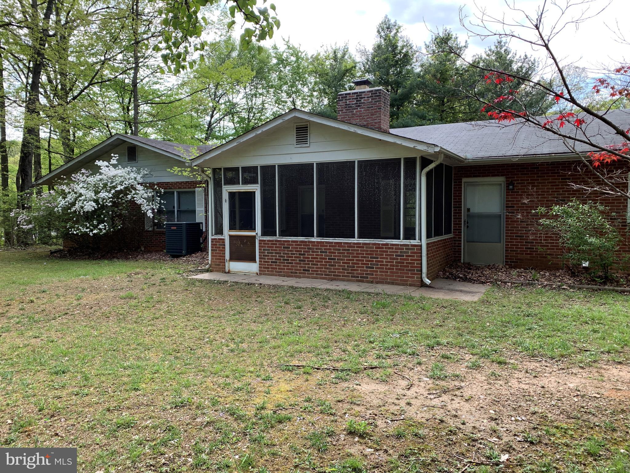 4515 Shirley Gate Road Fairfax, VA 22030 - Photo 2 of 26 a view of a house with a garden