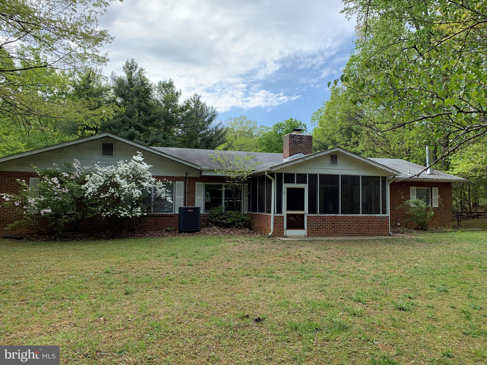 4515 Shirley Gate Road Fairfax, VA 22030 - Photo 3 of 26 a front view of a house with garden