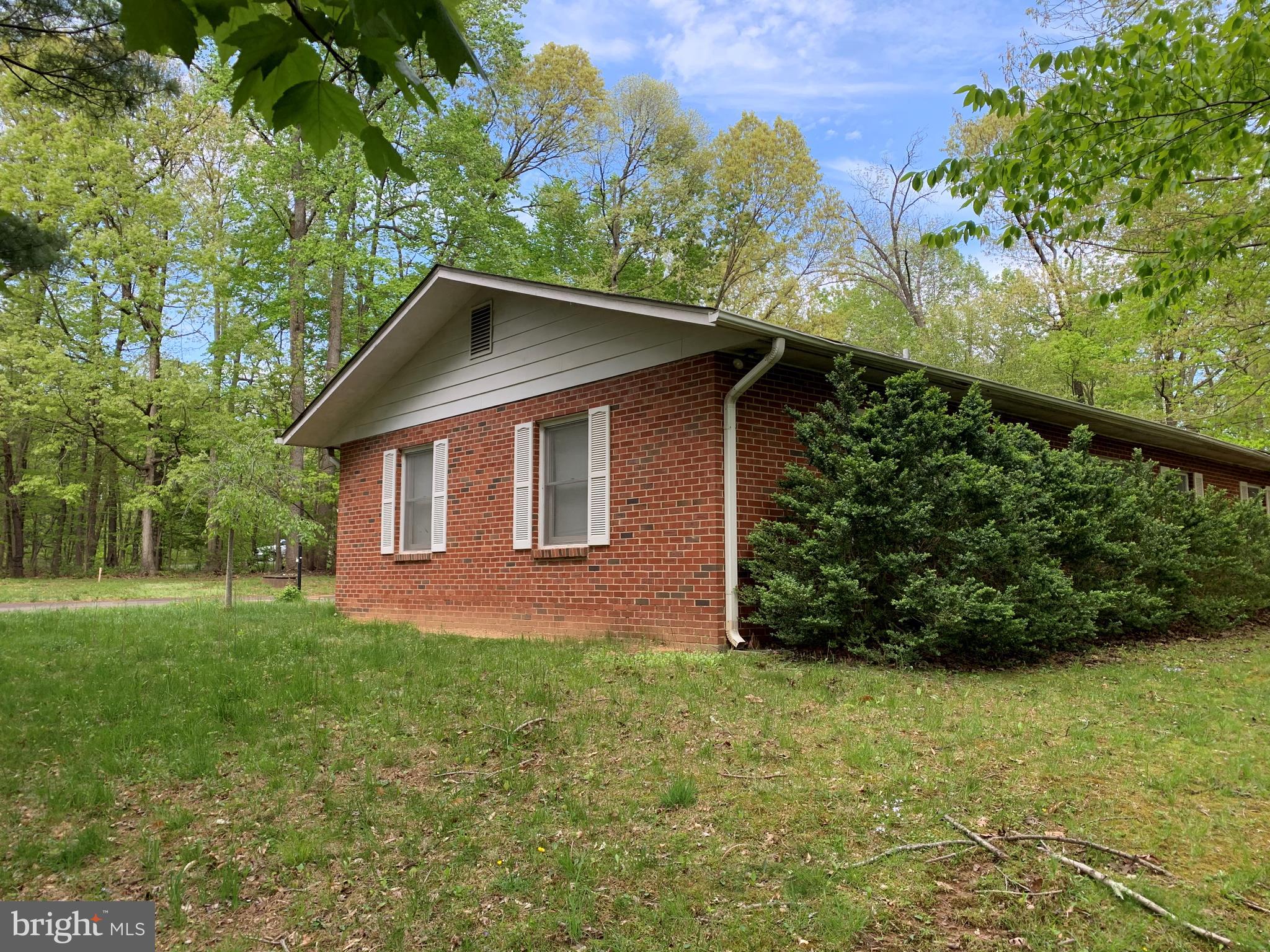 4515 Shirley Gate Road Fairfax, VA 22030 - Photo 7 of 26 a front view of a house with a yard