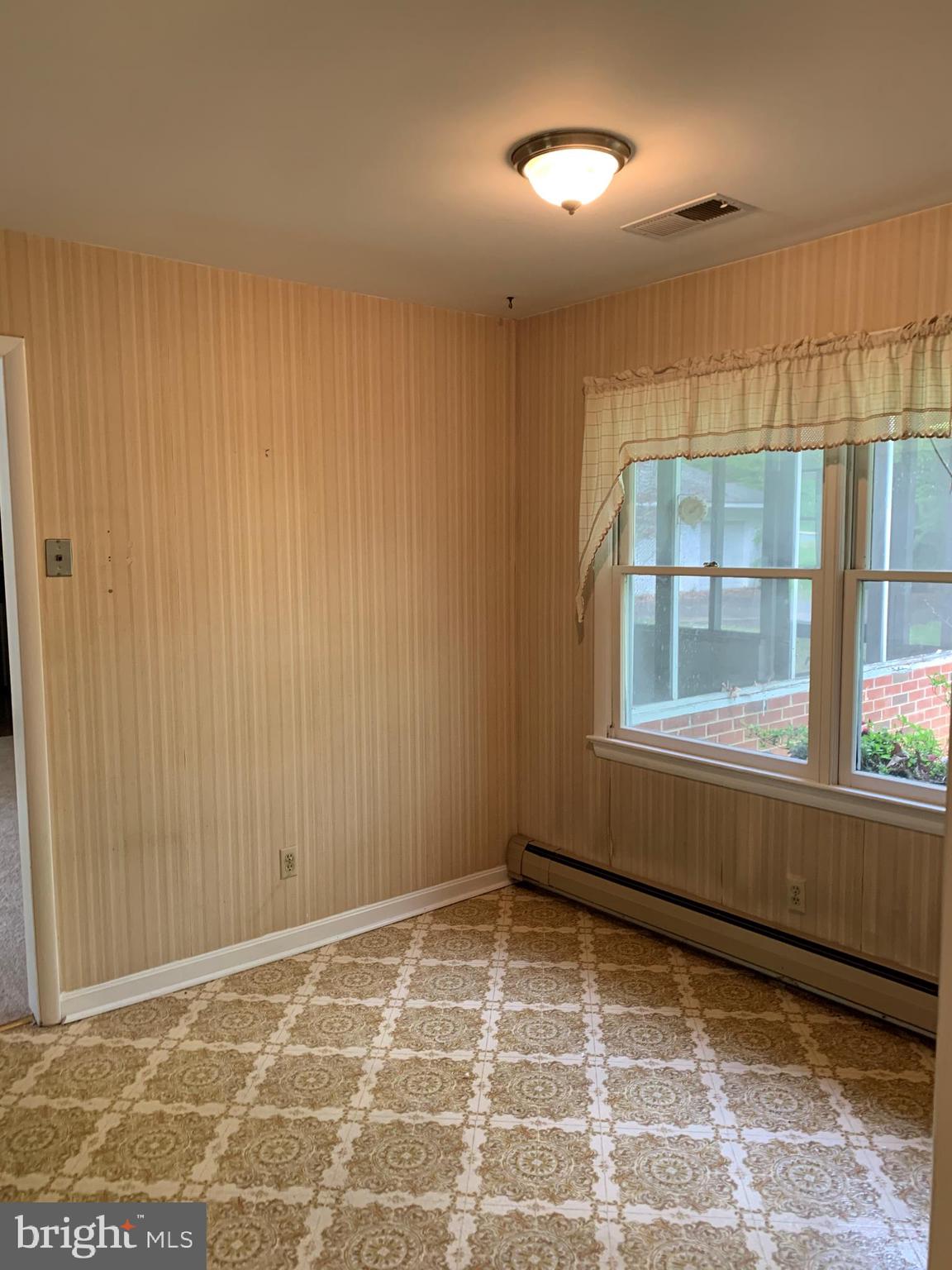 4515 Shirley Gate Road Fairfax, VA 22030 - Photo 9 of 26 a view of an empty room with a window