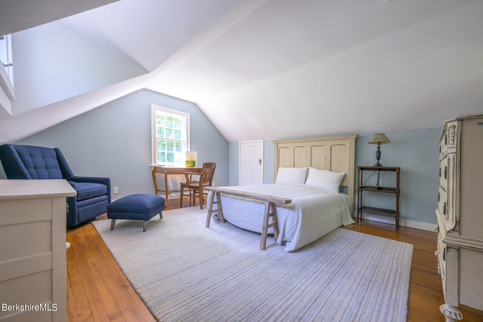 4 Austerlitz Road West Stockbridge, MA 01266 - Photo 26 of 42 a bedroom with furniture and a wooden floor