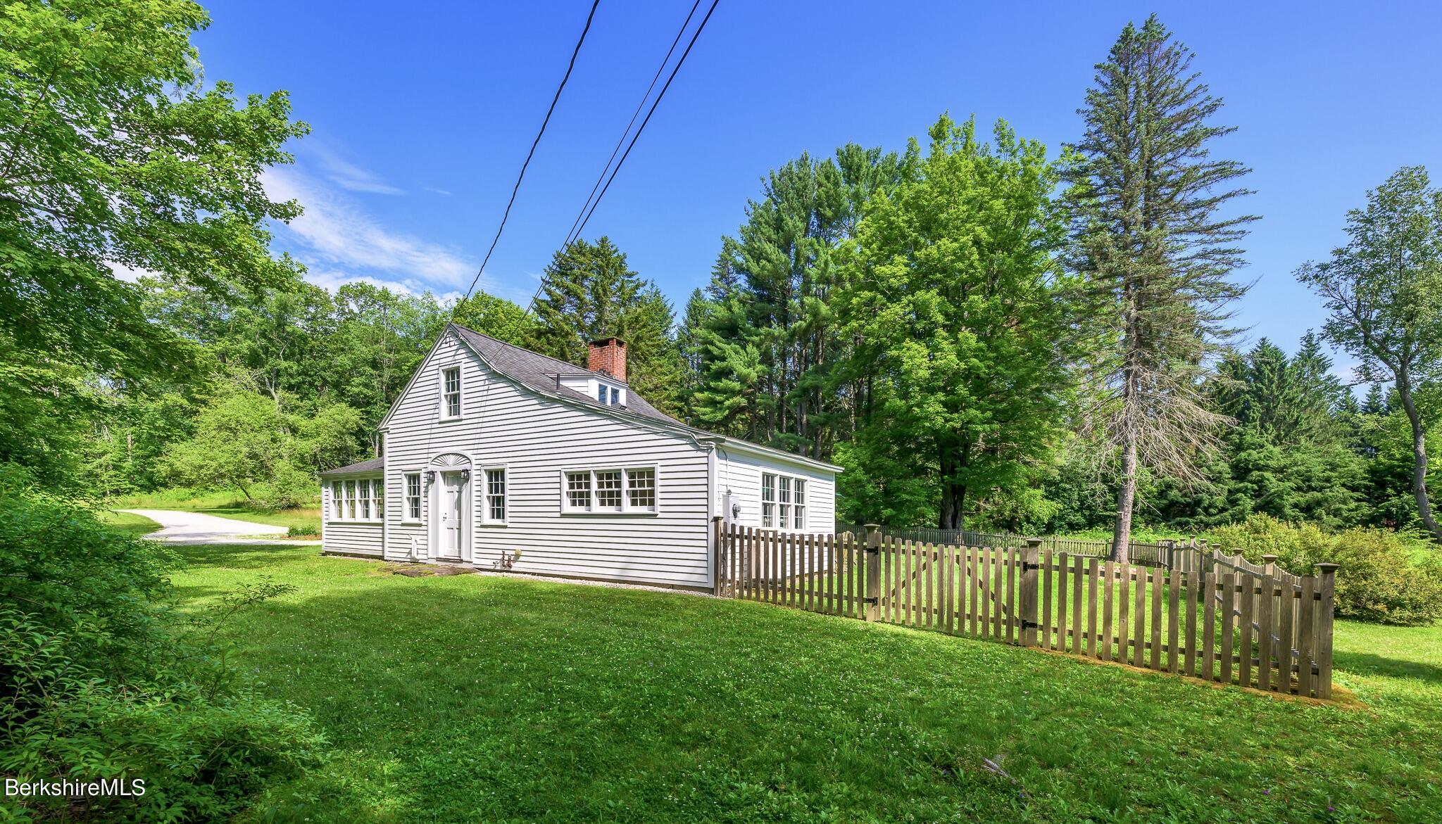 4 Austerlitz Road West Stockbridge, MA 01266 - Photo 3 of 42 a view of an house with backyard space and garden