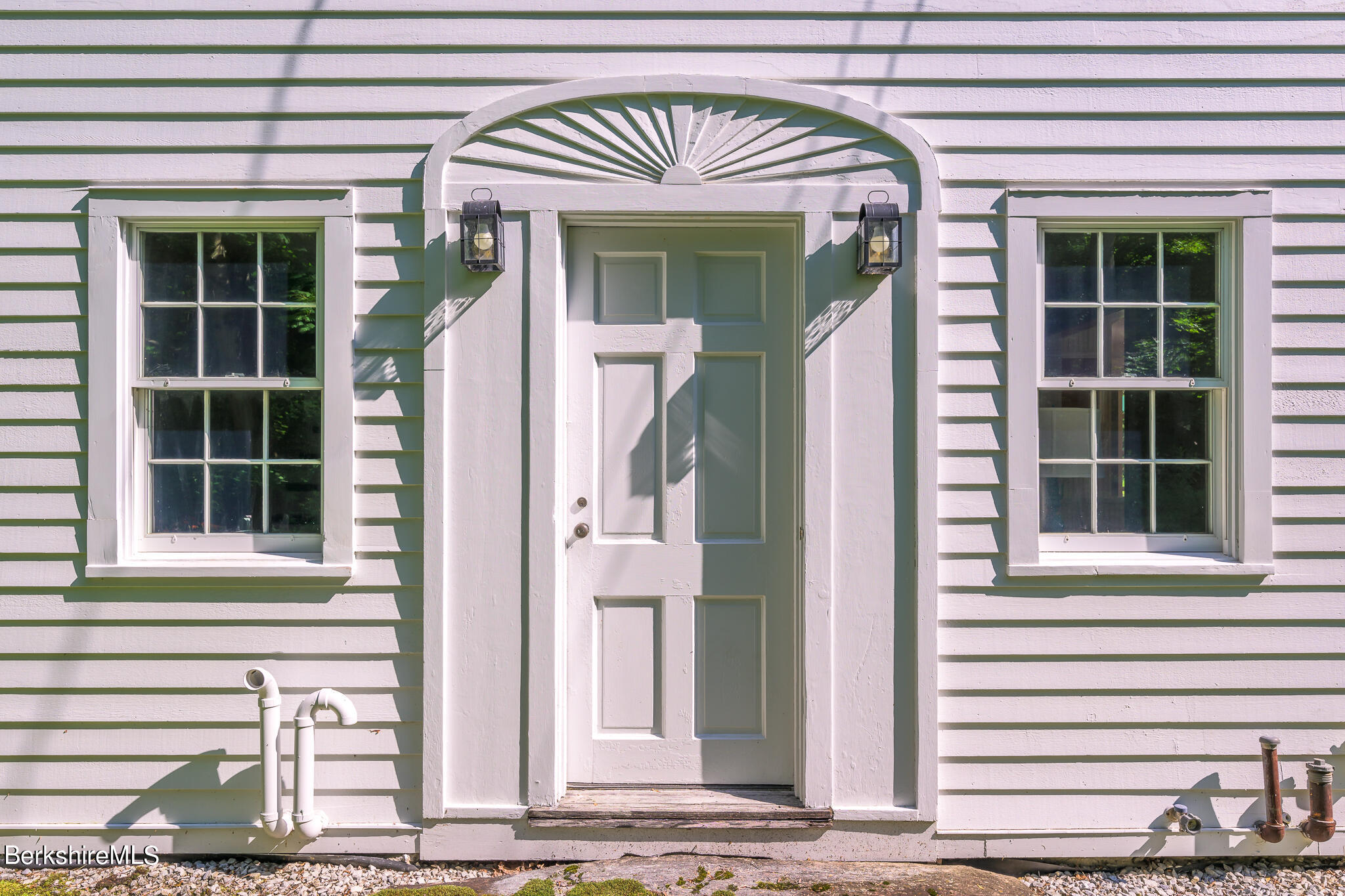 4 Austerlitz Road West Stockbridge, MA 01266 - Photo 5 of 42 a front view of a house with a window