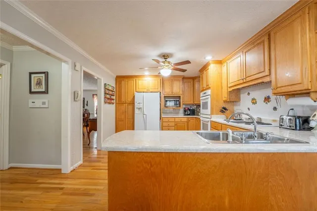 a bed room with a bed and a chair