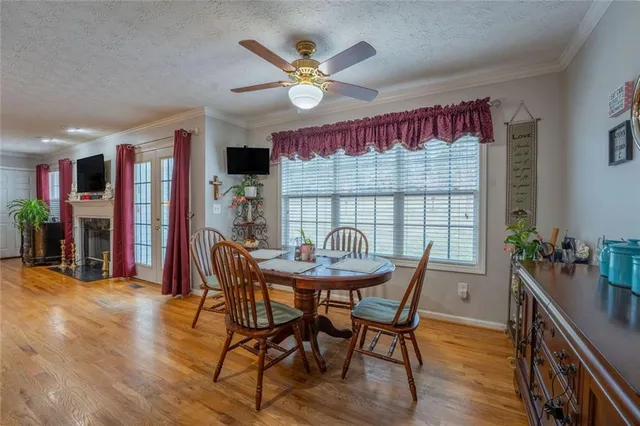 a kitchen with stainless steel appliances granite countertop a sink and cabinets