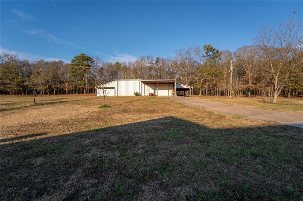2440 Deadwyler Road Maysville, GA 30558 - Photo 60 of 79 a view of big yard with a house