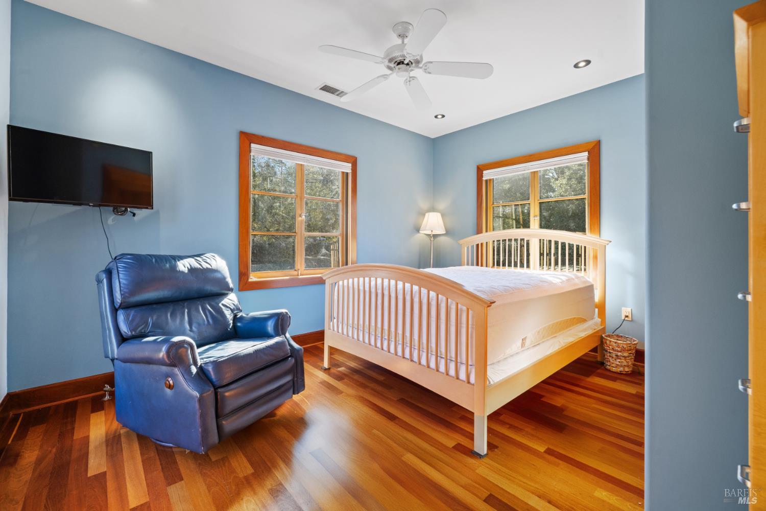 1545 North Castle Road Sonoma, CA 95476 - Photo 12 of 19 a bedroom with a bed and a couch