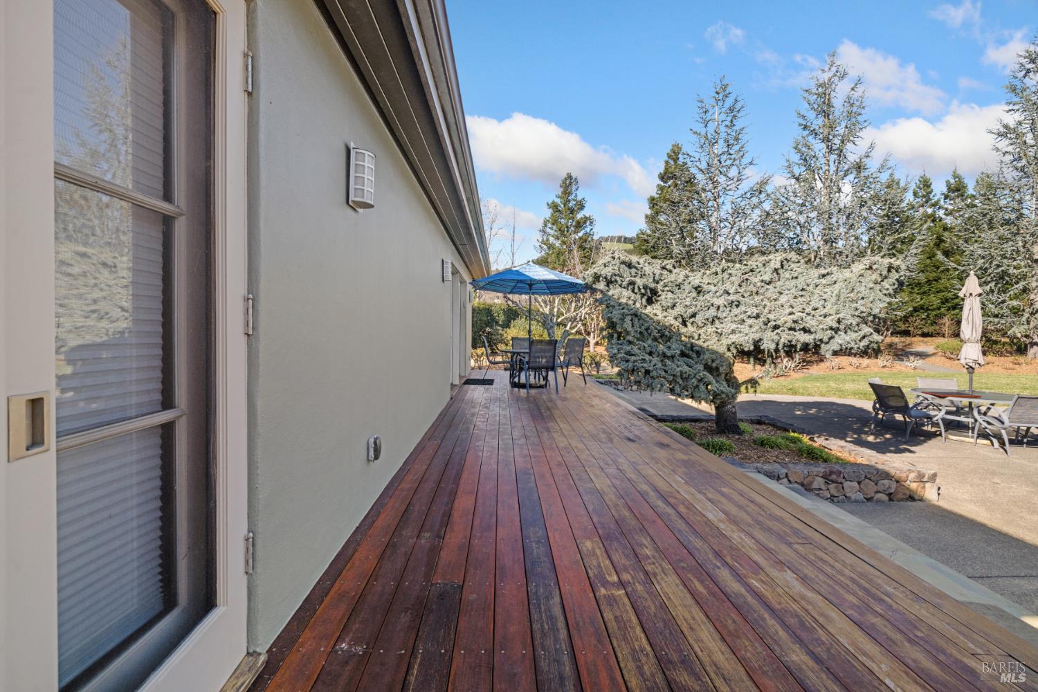 1545 North Castle Road Sonoma, CA 95476 - Photo 16 of 19 a balcony with wooden floor and outdoor seating
