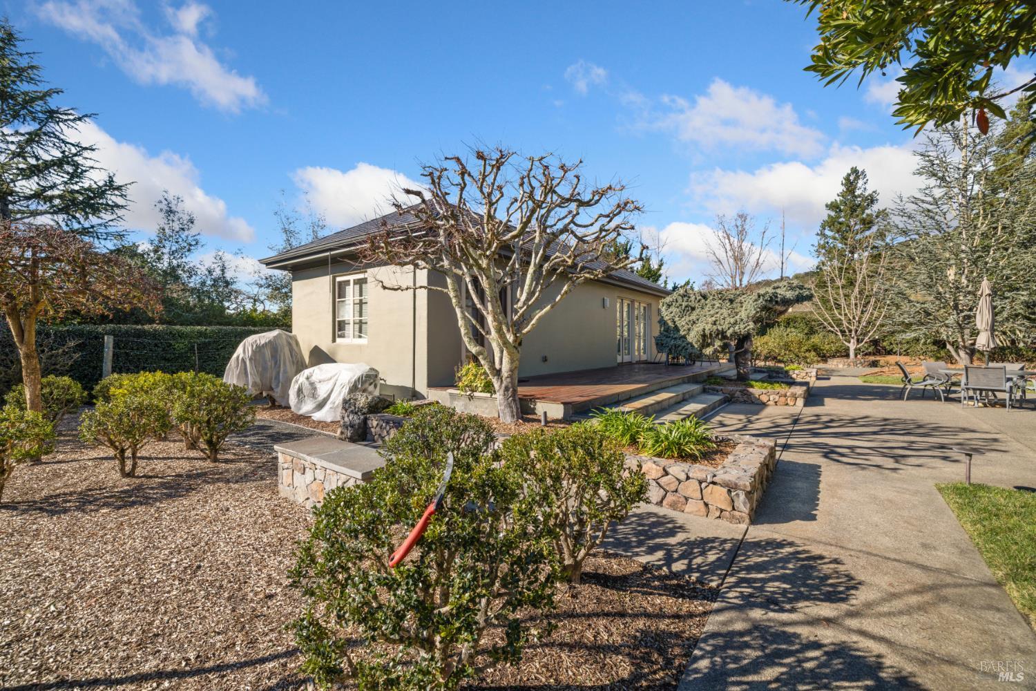 1545 North Castle Road Sonoma, CA 95476 - Photo 2 of 19 a front view of a house with garden
