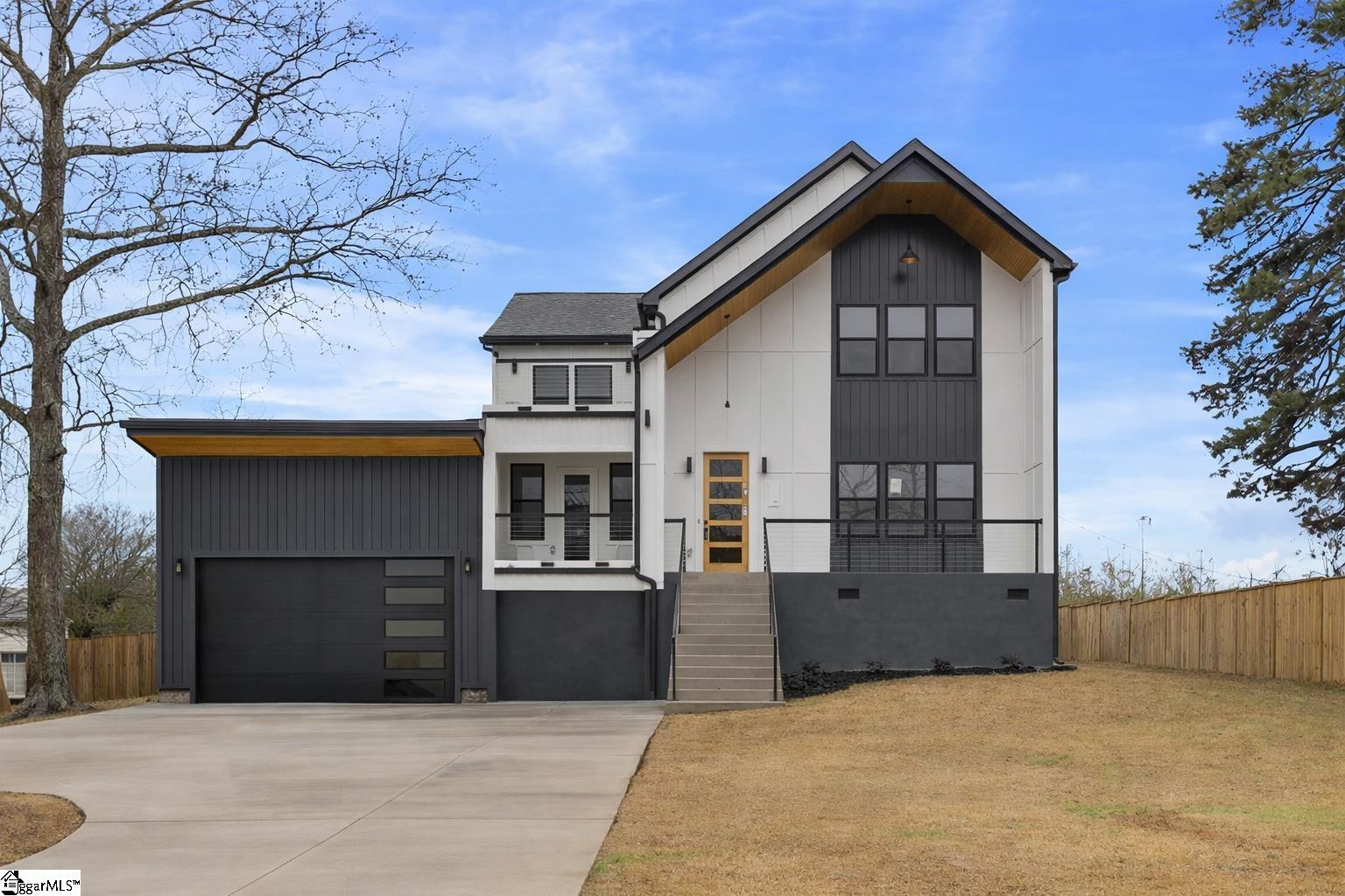 209 Redmond Drive Fountain Inn, SC 29644 - Photo 1 of 50 This is a rendering of what the home will look like after the additional garage is added on.