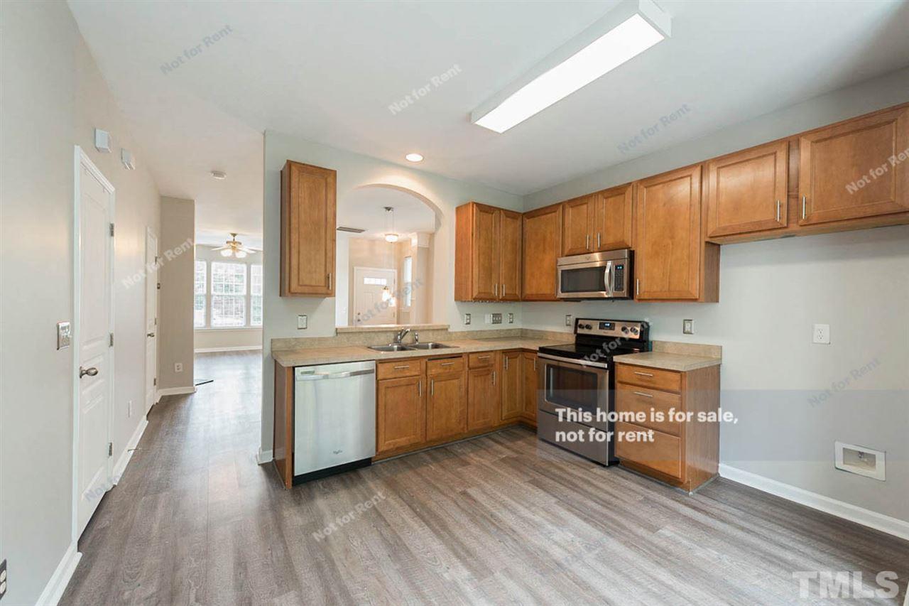 7631 Satinwing Lane Raleigh, NC 27617 - Photo 6 of 14 Gallery Image 6