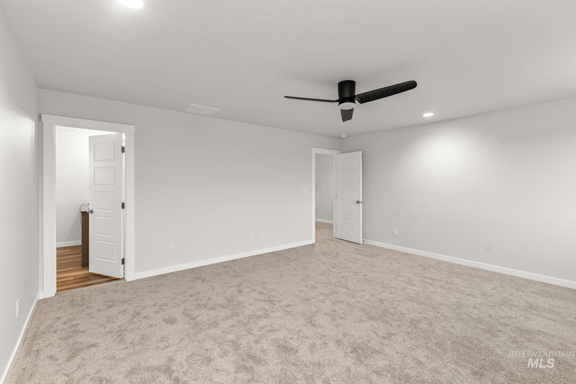 3762 West Maypearl Street Meridian, ID 83642 - Photo 23 of 29 Unfurnished bedroom with recessed lighting, carpet floors, and a ceiling fan