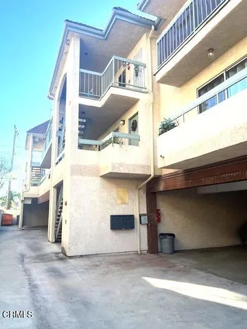 a front view of a house with a garage