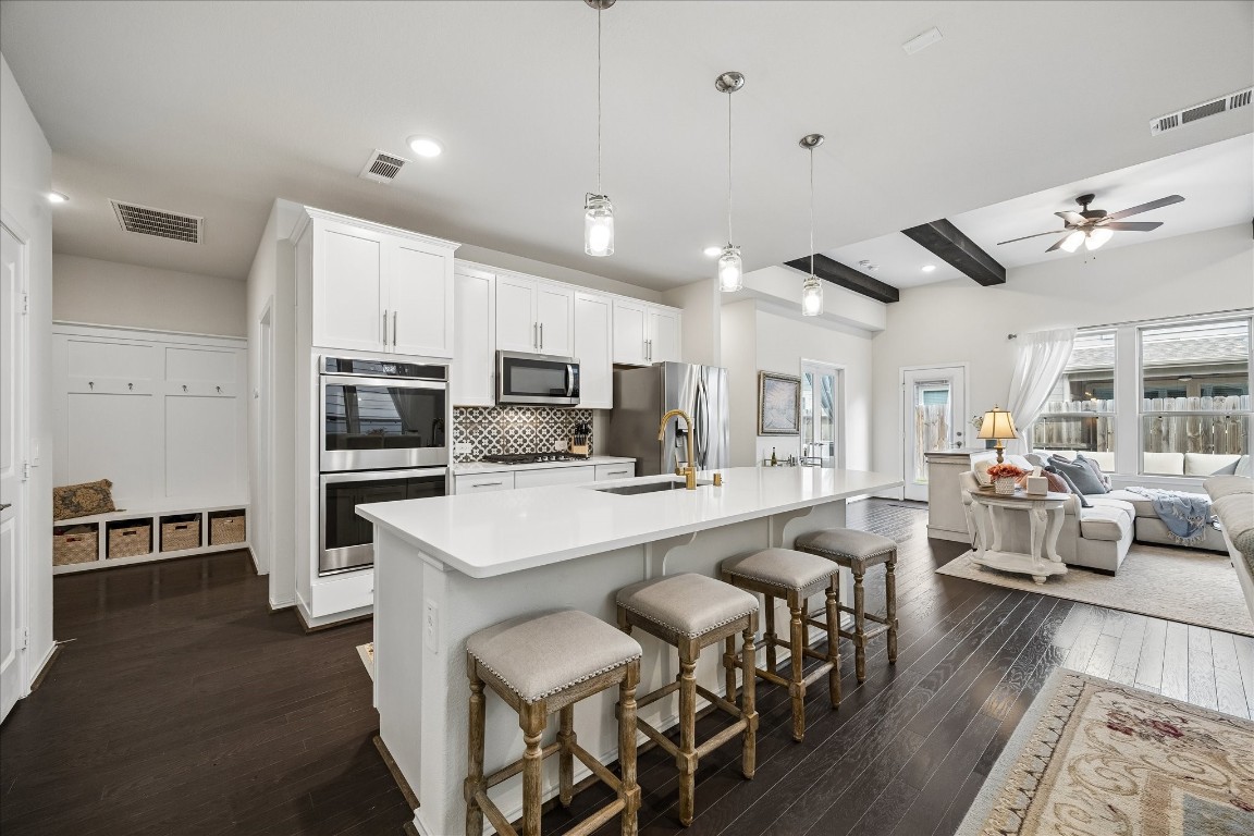 4026 Delta Rose Street Houston, TX 77018 - Photo 14 of 44 The kitchen offers abundant storage and extra counter space, creating the perfect set up for effortless cooking and entertaining.