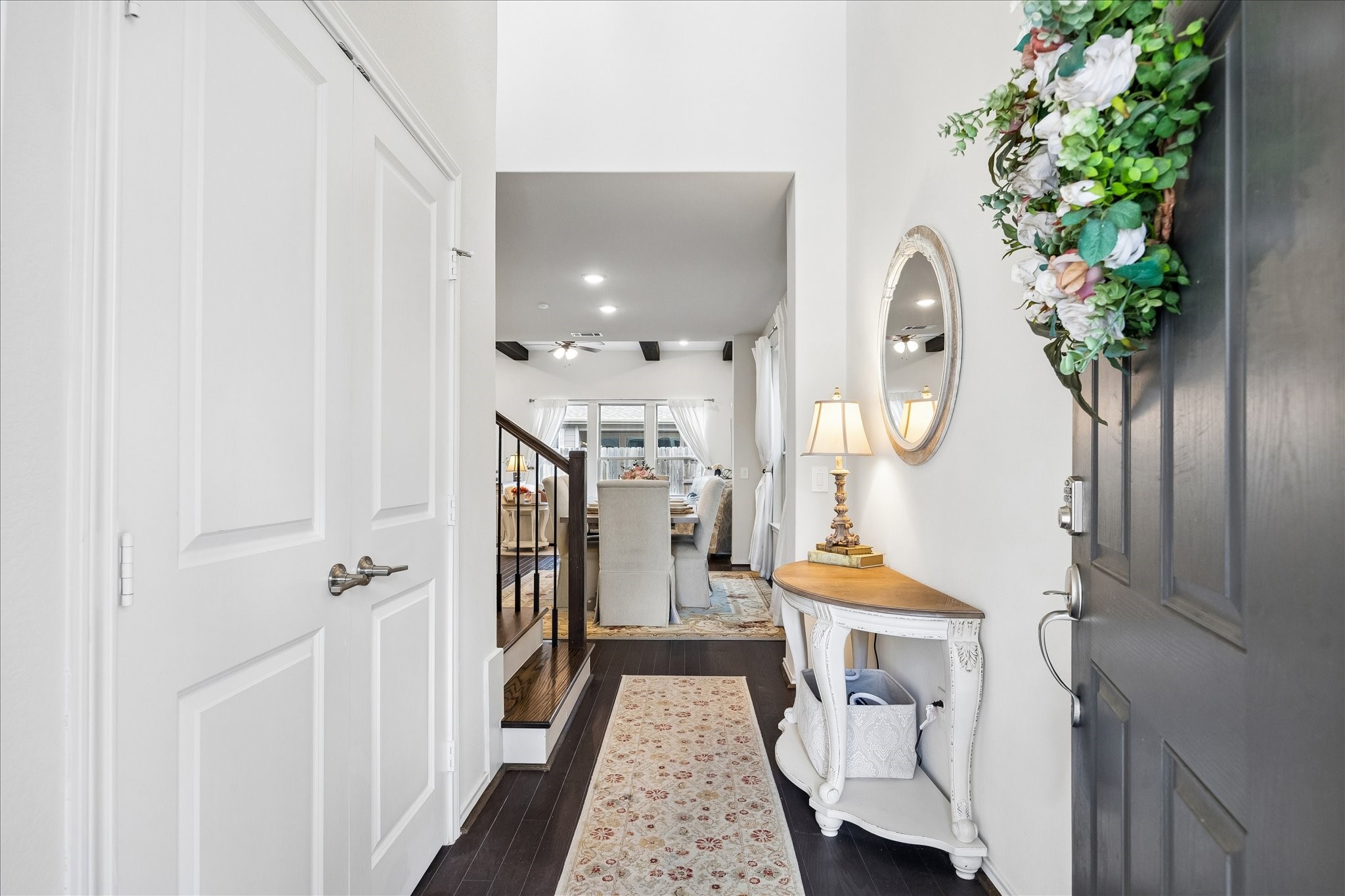 4026 Delta Rose Street Houston, TX 77018 - Photo 2 of 44 Welcoming entryway with charcoal oak hardwood floors and neutral walls opening to a light filled living space.