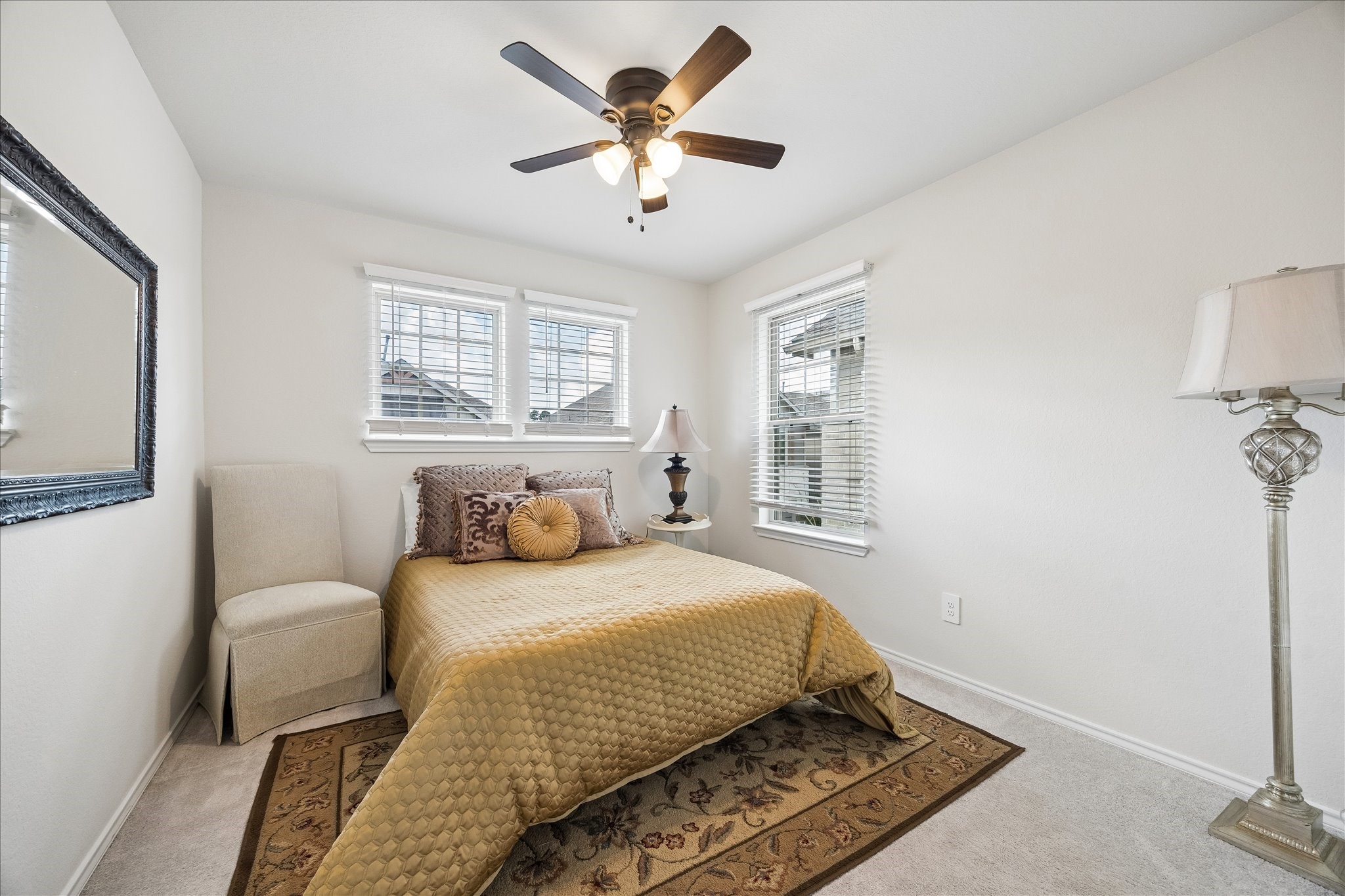 4026 Delta Rose Street Houston, TX 77018 - Photo 22 of 44 Third guest room features elongated windows for natural light, ceiling fan with light kit for added comfort and versatile color palette ready for any style.