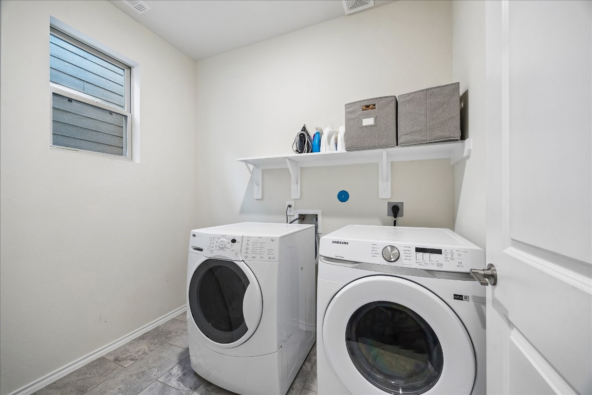 4026 Delta Rose Street Houston, TX 77018 - Photo 25 of 44 Dedicated laundry room with upper shelving for storage.