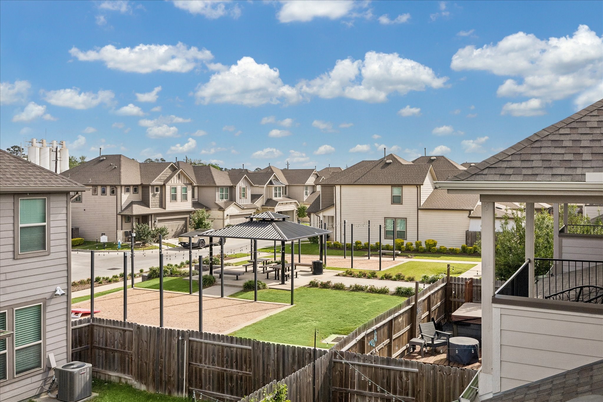 4026 Delta Rose Street Houston, TX 77018 - Photo 28 of 44 Elevated view overlooking neighborhood green space with pavilion and open lawn areas.