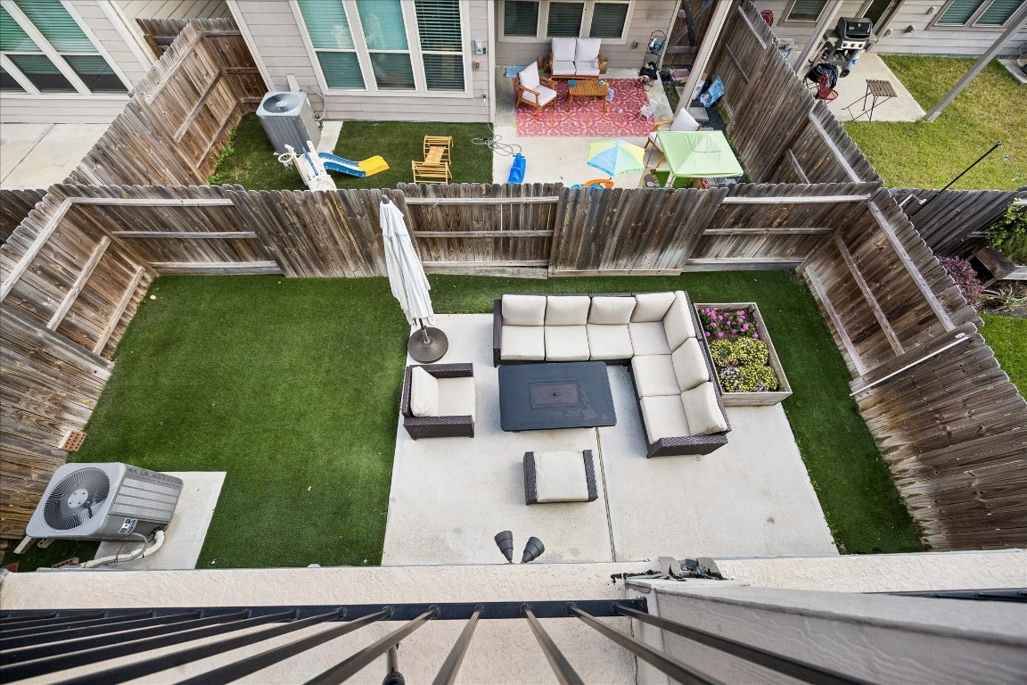 4026 Delta Rose Street Houston, TX 77018 - Photo 30 of 44 Private backyard with patio seating area and low maintenance turf.