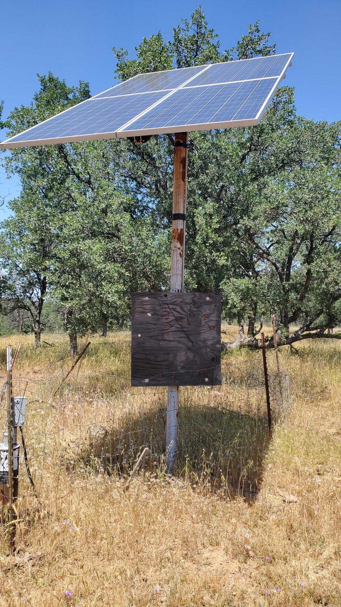Garrison Road Cottonwood, CA 96022 - Photo 2 of 23 a view of a yard with a bench