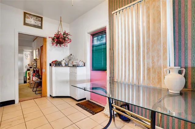 a room with stairs and furniture