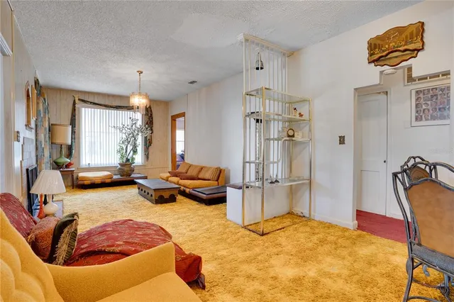 a bedroom with furniture and a bed