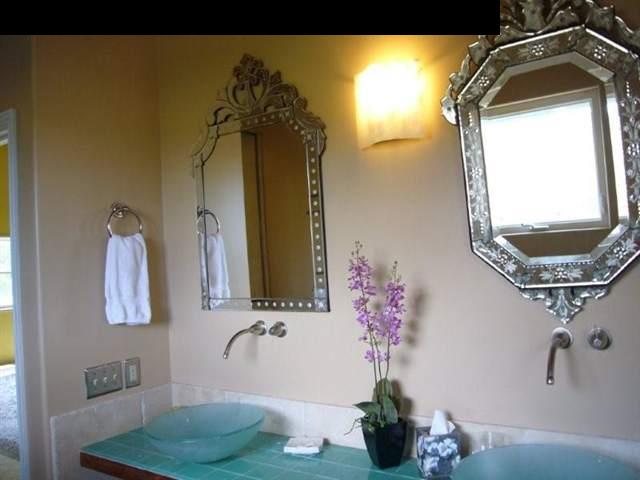 347 Holopuni Road Kula, HI 96790 - Photo 14 of 22 a bathroom with a sink and a mirror