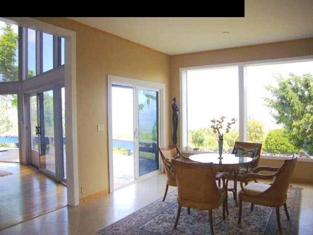 347 Holopuni Road Kula, HI 96790 - Photo 7 of 22 a view of a dining room with furniture window and wooden floor