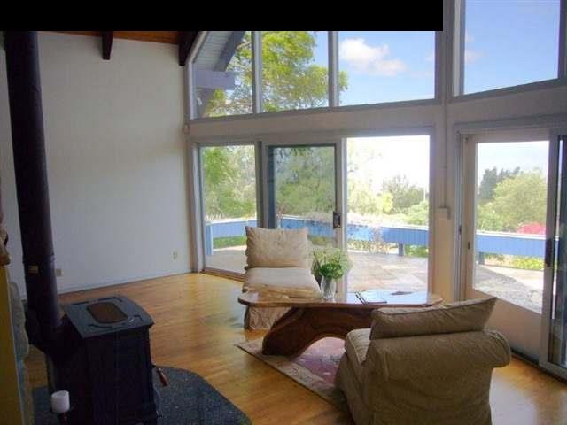 347 Holopuni Road Kula, HI 96790 - Photo 9 of 22 a living room with furniture and a window
