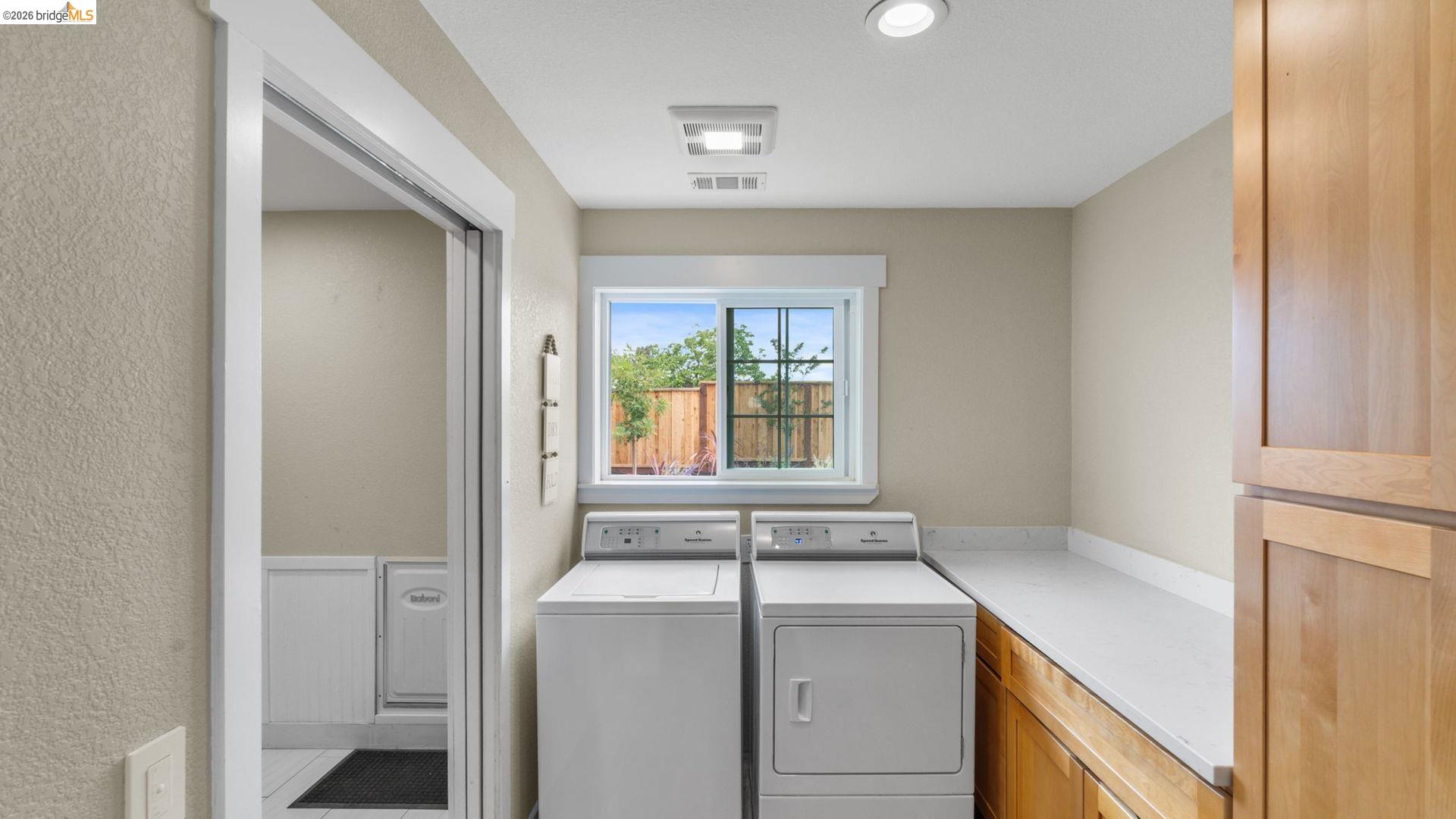 700 Brownstone Road Oakley, CA 94561 - Photo 25 of 58 a view of storage and utility room with washer and dryer